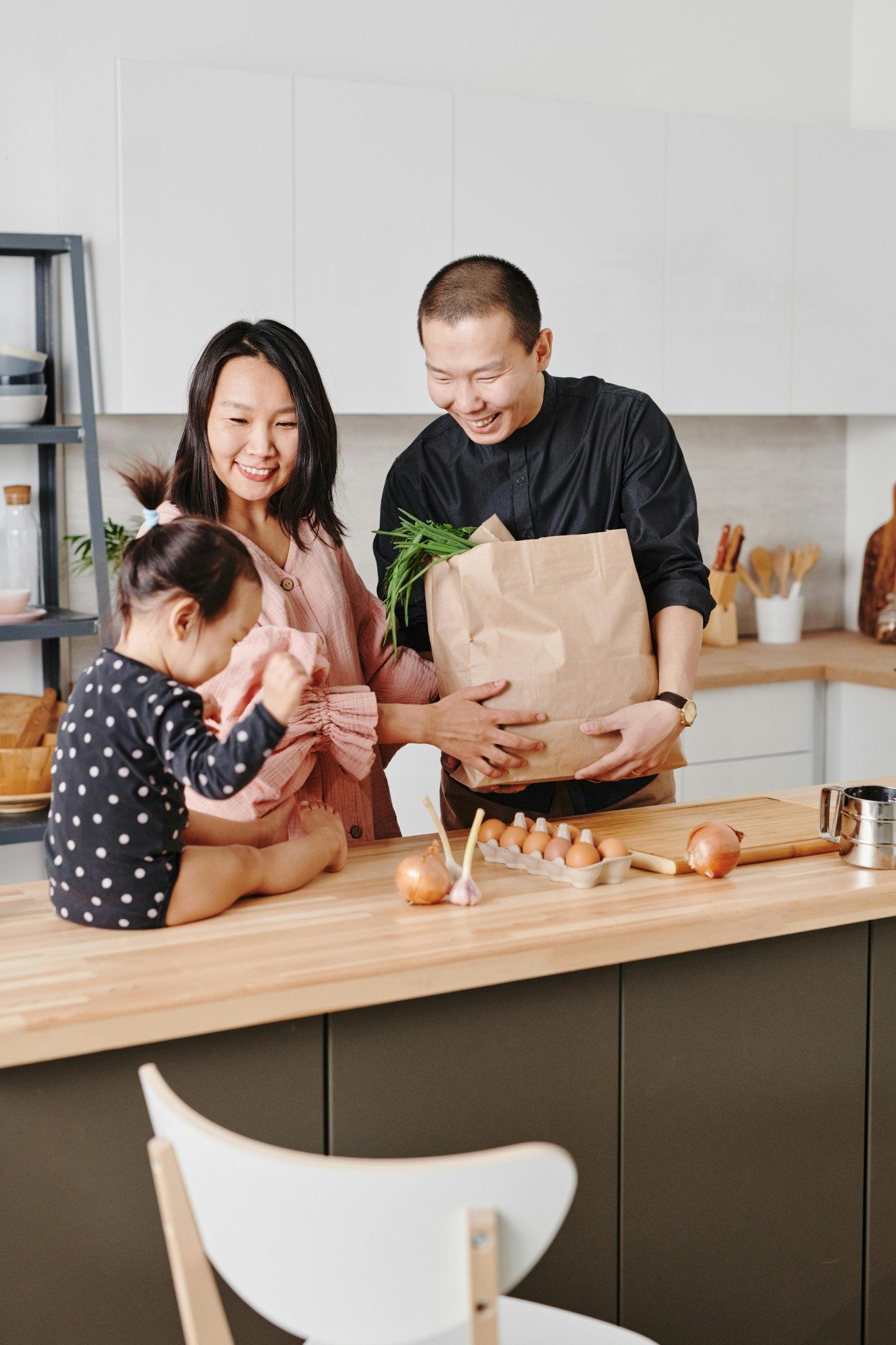 Family together in a bright kitchen